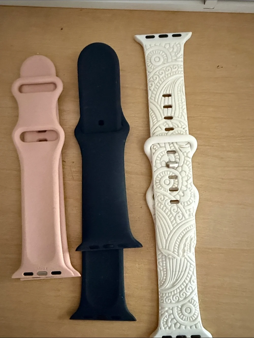 Apple Replacement Silicone Watch Bands in Pink, Black, and White Embossed